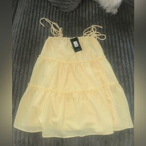 NEW WITH TAGS woman’s fashion nova baby doll dress size XS